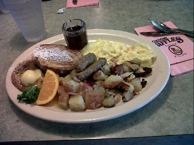 Cinnamon Roll French Toast with Sausage and Eggs