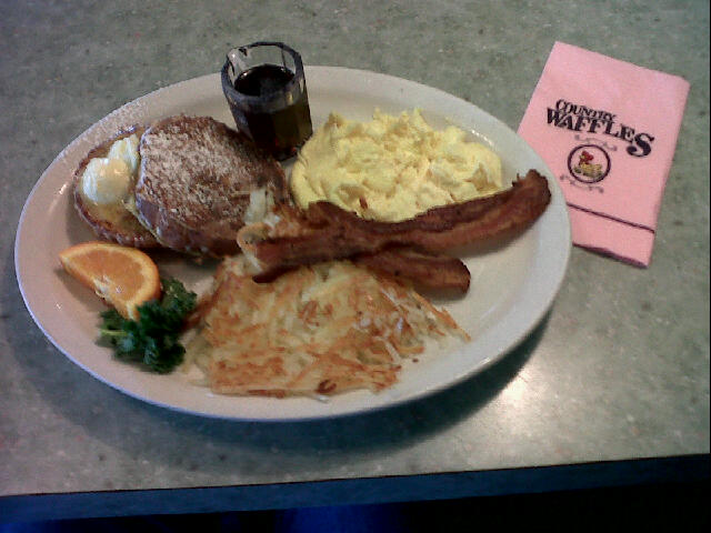 Cinnamon Roll French Toast with Bacon and Eggs