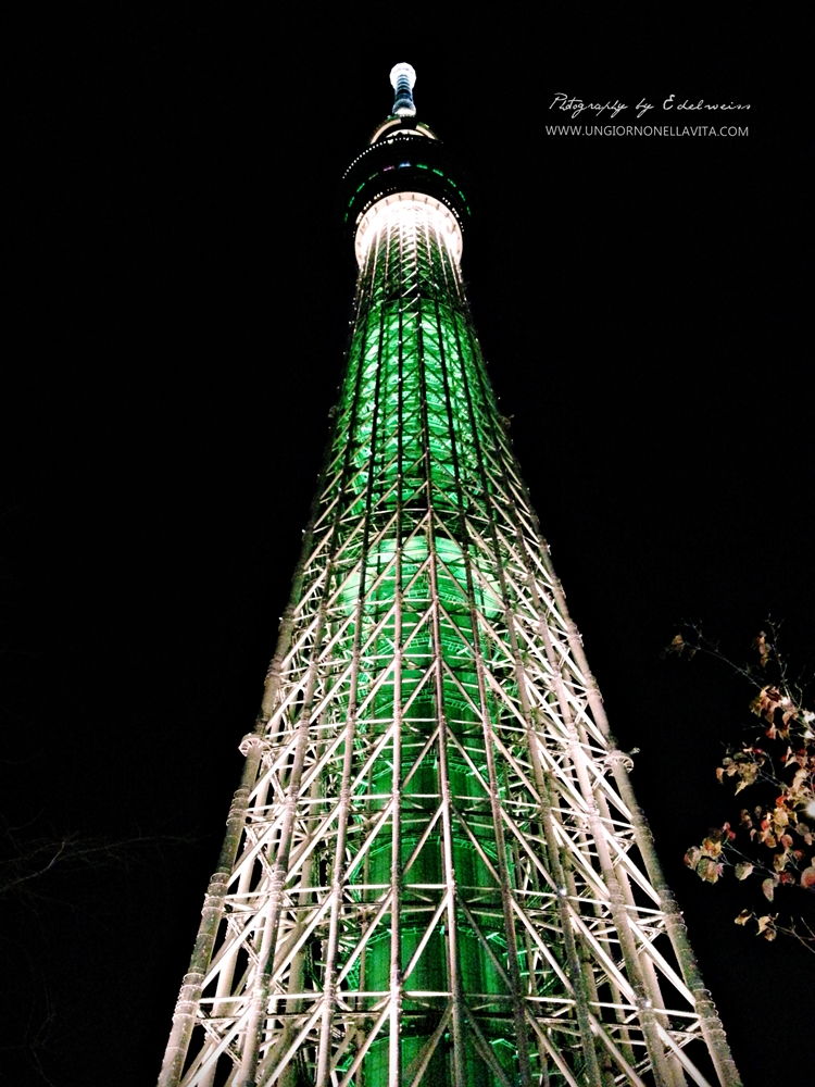Design  The design was published on 24 November 2006, based on the following three concepts: Fusion of neofuturistic design and the traditional beauty of Japan, Catalyst for revitalization of the city, Contribution to disaster prevention – "Safety and Security". The base of the tower has a structure similar to a tripod; from a height of about 350 m (1,150 ft) and above, the tower's structure is cylindrical to offer panoramic views of the river and the city.[10] There are observatories at 350 m (1,150 ft), with a capacity of up to 2000 people, and 450 m (1,480 ft), with a capacity of 900 people.[11] The upper observatory features a spiral, glass-covered skywalk in which visitors ascend the last 5 meters to the highest point at the upper platform. A section of glass flooring gives visitors a direct downward view of the streets below. Earthquake resistance[edit] The tower has seismic proofing, including a central shaft made of reinforced concrete. The main internal pillar is attached to the outer tower structure 125 meters (410 ft) above ground. From there until 375 meters (1,230 ft) the pillar is attached to the tower frame with oil dampers, which act as cushions during an earthquake. According to the designers, the dampers can absorb 50 percent of the energy from an earthquake. Colour[edit] The exterior lattice is painted a colour officially called "Skytree White". This is an original colour based on a bluish white traditional Japanese colour called aijiro (藍白?). Illumination[edit] The illumination design was published on 16 October 2009. Two illumination patterns Iki (chic, stylish) sky blue and Miyabi (elegance, refinement) purple will be used, alternating daily. The tower is illuminated using LED lights. (Wikipedia)